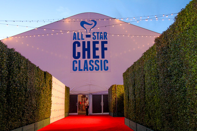 A red carpet and hedges created a VIP entrance for the Lexus All-Star Chef Classic event on the Event Deck.